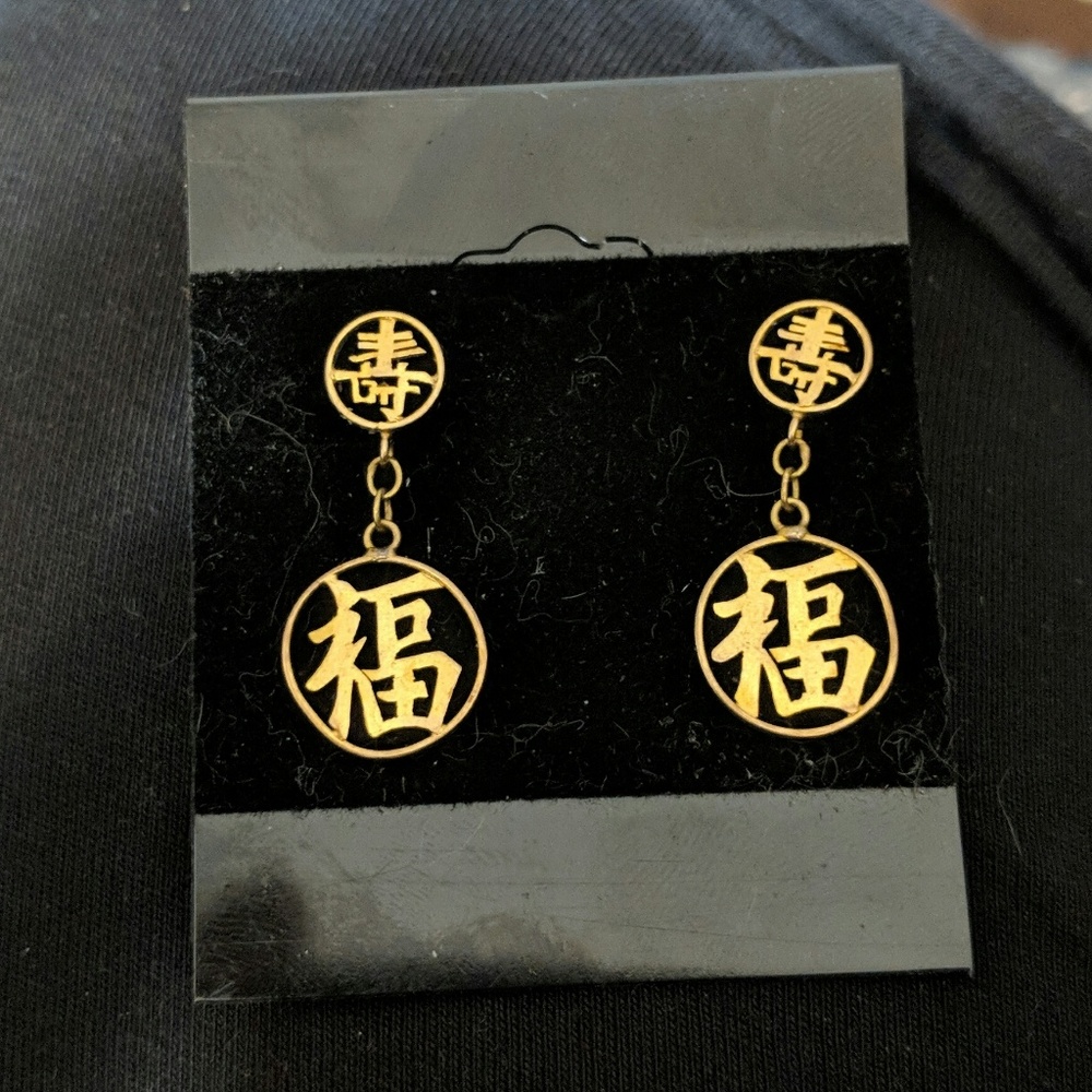 14K gold earrings.